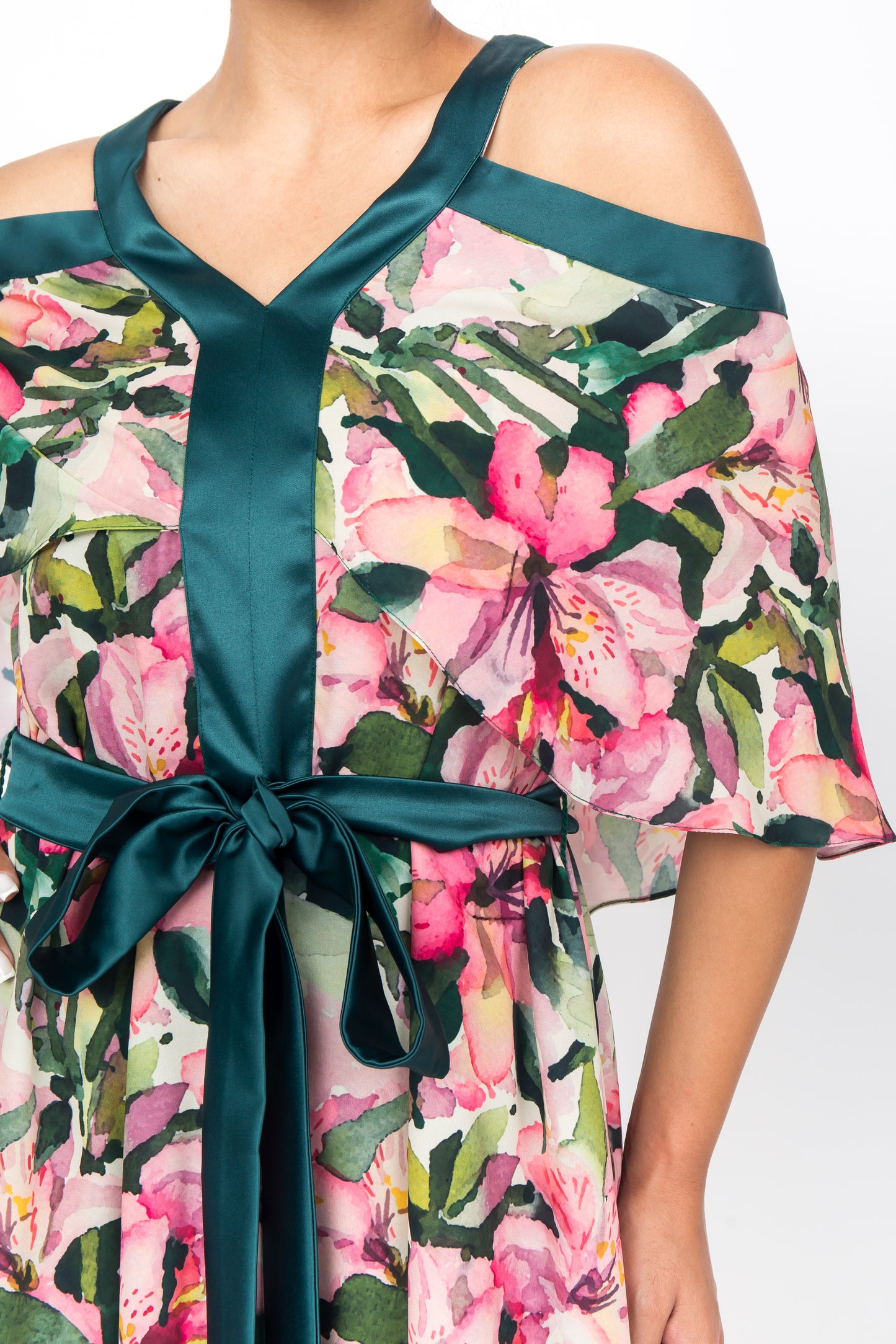 Eye-catching tropical print dress made from luxurious silk with a flattering V-neckline and cut-away shoulders.