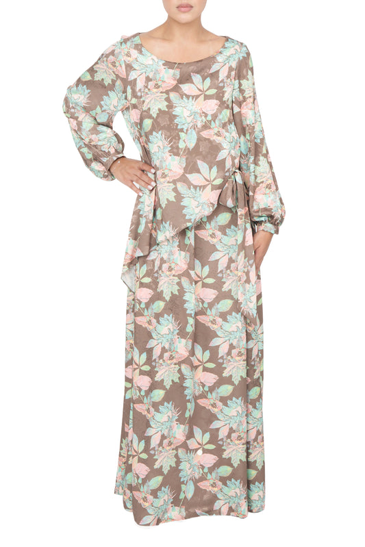 This dress features a colorful print, flattering overlay front panel, and comfortable puff sleeves tied at the side.