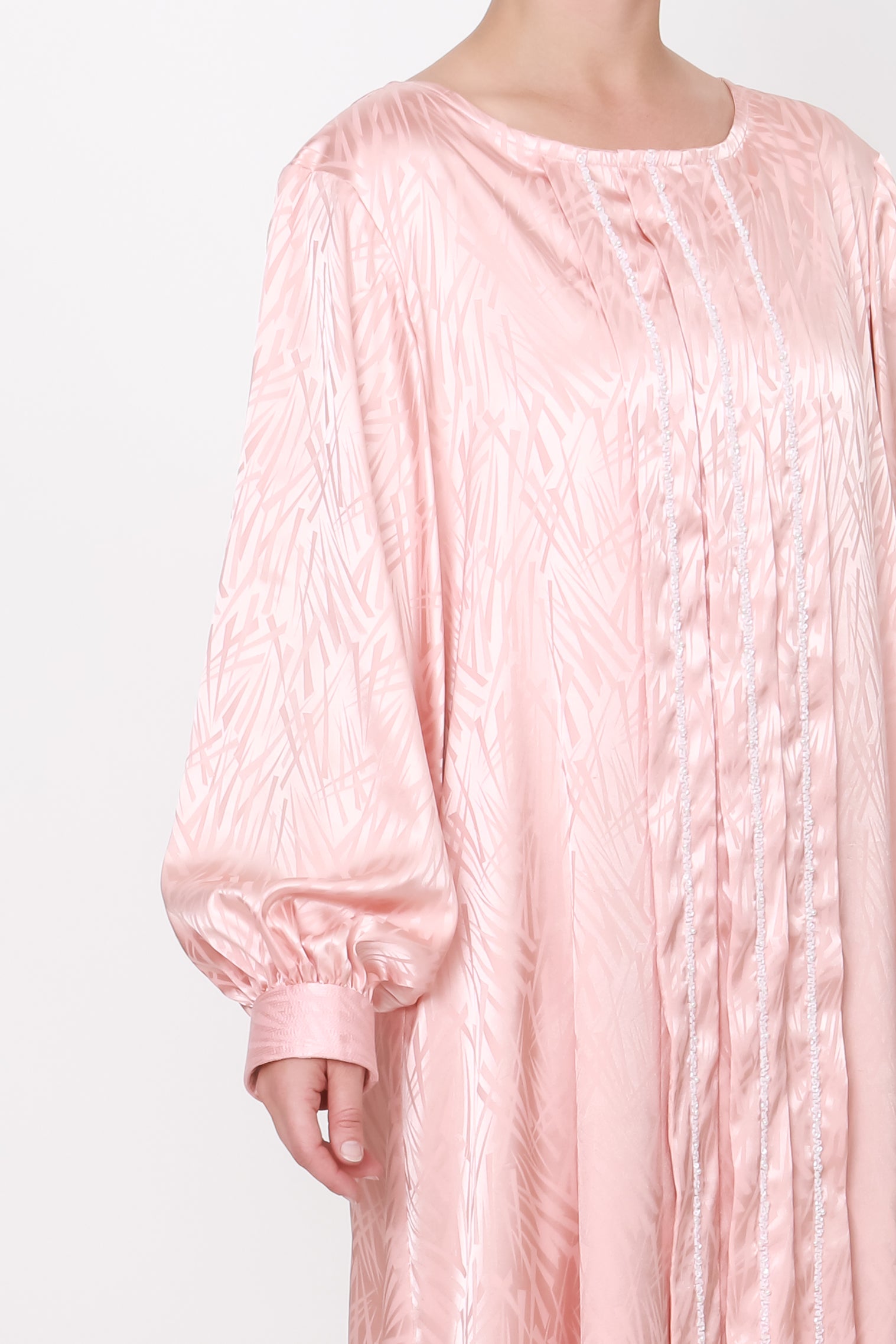 Luxurious pink silk jacquard dress with pleated front and bands of white pearls and bugle beads