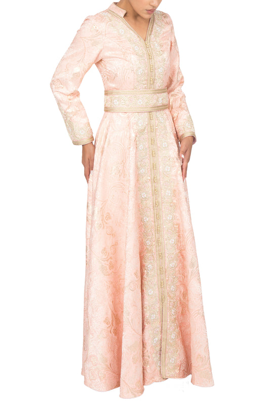 Elegant pink silk brocade Moroccan style dress with beautiful gold metallic embroidery on front full length, belt, and sleeves. Adorned with gold sequins and bugle beads, peridot Czech lead-free crystals, and traditional buttons.