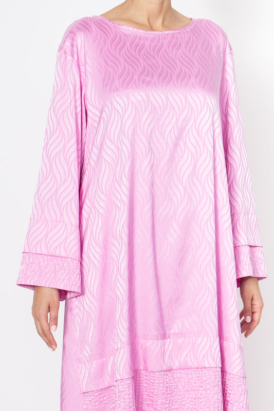 Loose-fitting pastel pink dress with unique fold detail