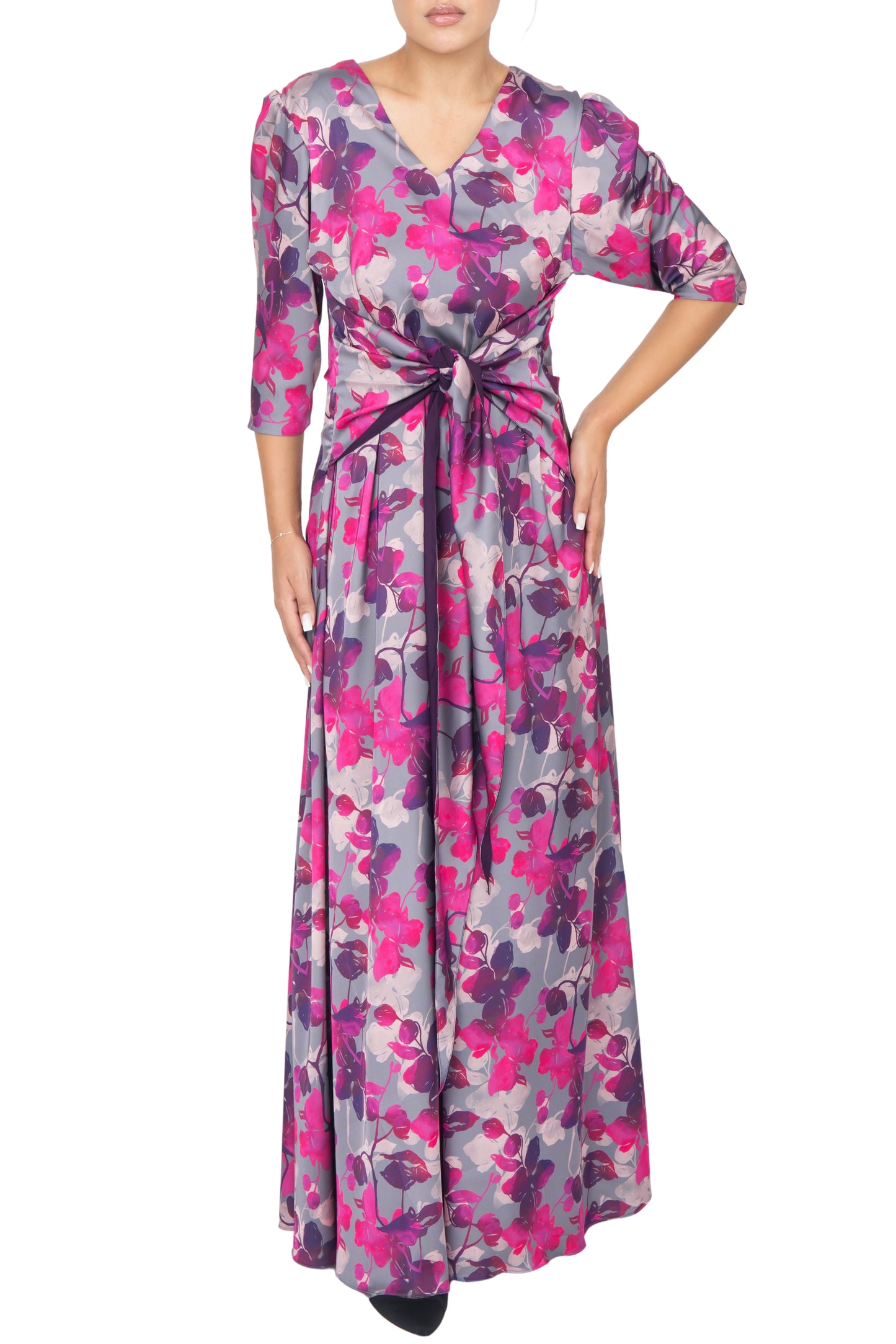 Beautiful purple and pink floral silk dress tied to the side, highlighting the wide band tie waist