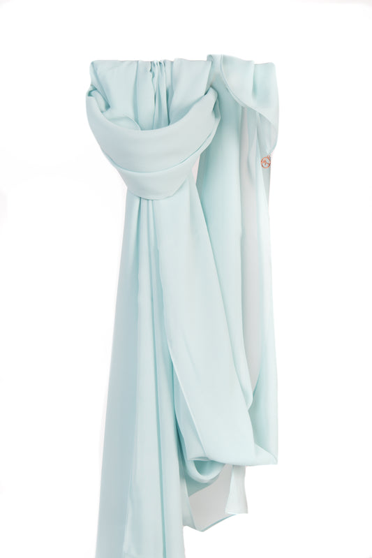 pale blue silk chiffon shayla draped elegantly, with a soft and luxurious texture, adding sophistication to any outfit