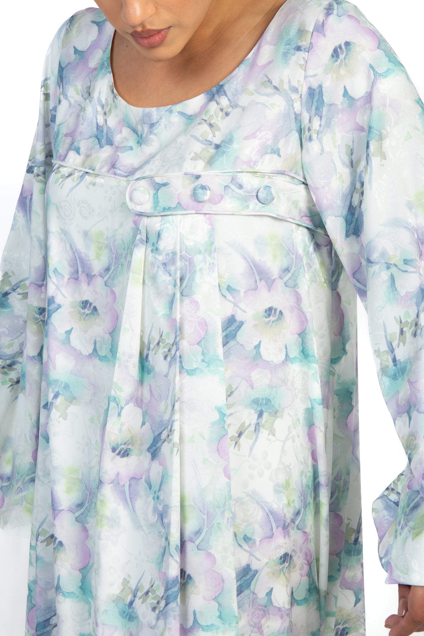 his ivory and soft lilac print silk dress is the perfect choice. With a loose-fitting silhouette, round neckline, and long sleeves, it's perfect for any occasion. The pleating detail adds a touch of elegance, while the light material keeps you comfortable all day long